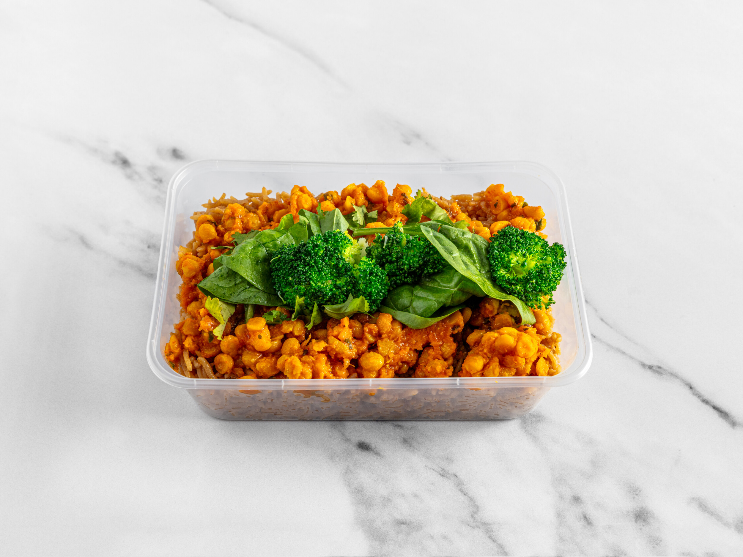 Lentil curry with pilau rice, broccoli and spinach